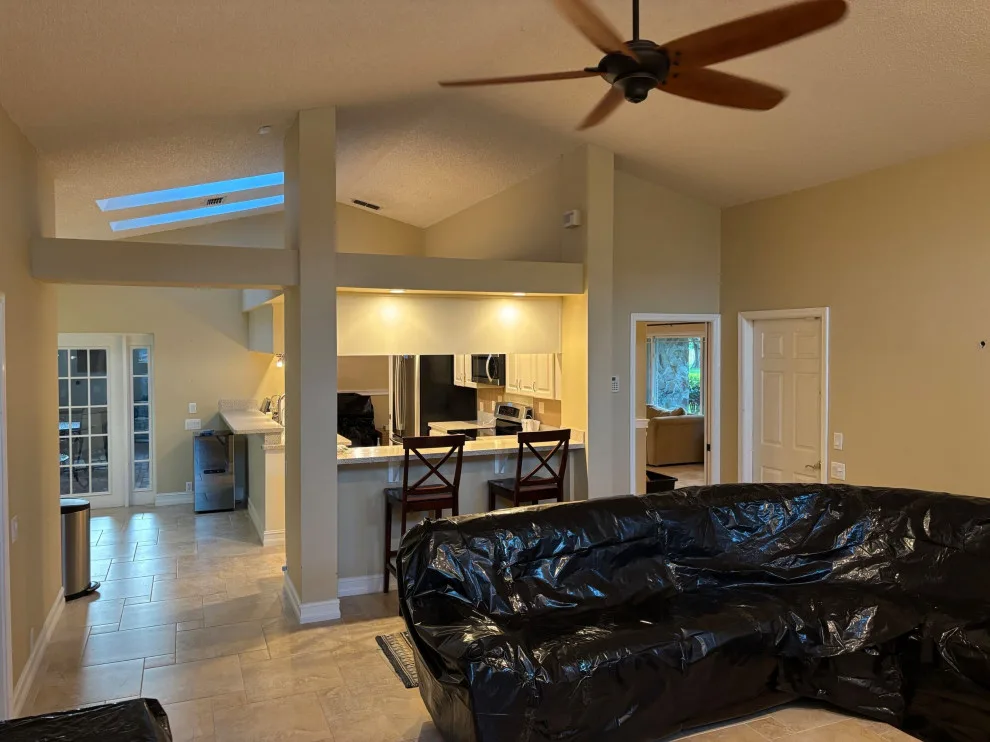 A Beautiful Kitchen Makeover Featuring Timeless White Cabinets by Kitchen Solvers Of The Gulf Coast - Photo 9