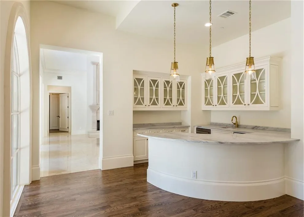 Brass and Acrylic at the Island by Boss Design Center - Photo 3