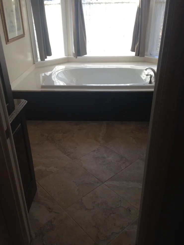 Anstine's Main Bathroom by Family Touch Remodeling LLC - Photo 13