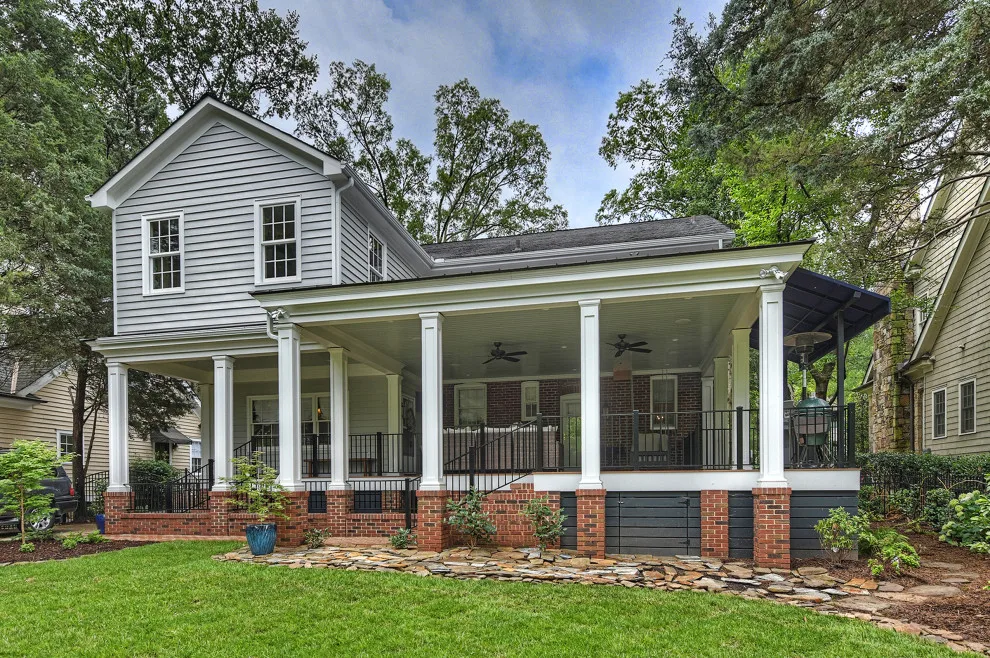 Entertainment-focused back porch by Hopedale Builders, Inc. - Photo 4