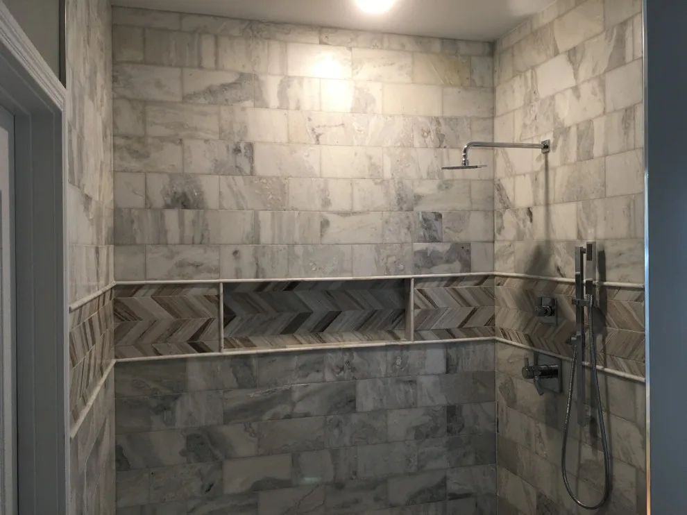 Basement apartment backsplash, updated master bathroom, bedroom flooring by Spencer Remodeling - Photo 15