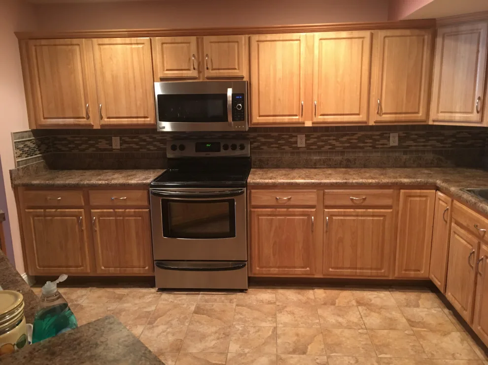 Basement apartment backsplash, updated master bathroom, bedroom flooring by Spencer Remodeling - Photo 12