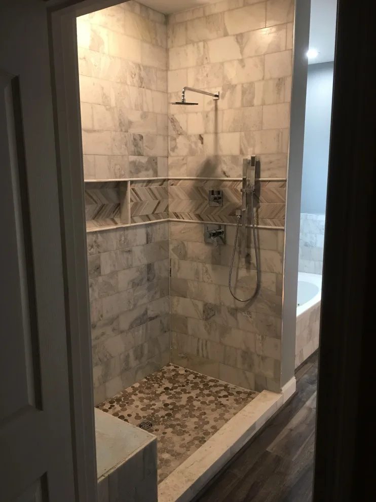 Basement apartment backsplash, updated master bathroom, bedroom flooring by Spencer Remodeling - Photo 3