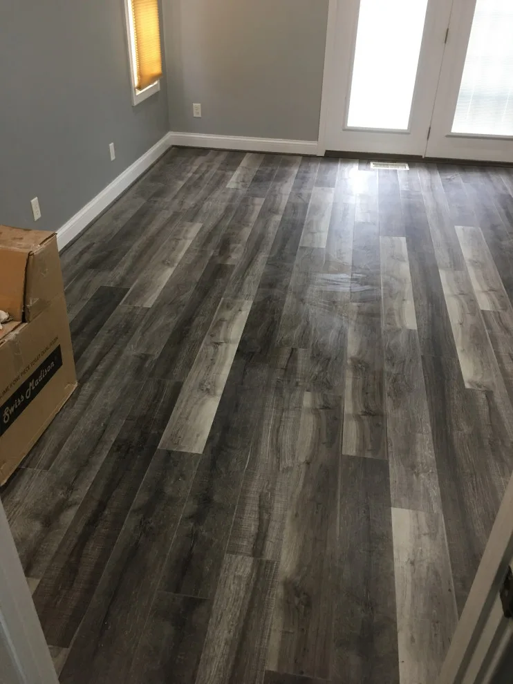 Basement apartment backsplash, updated master bathroom, bedroom flooring by Spencer Remodeling - Photo 11