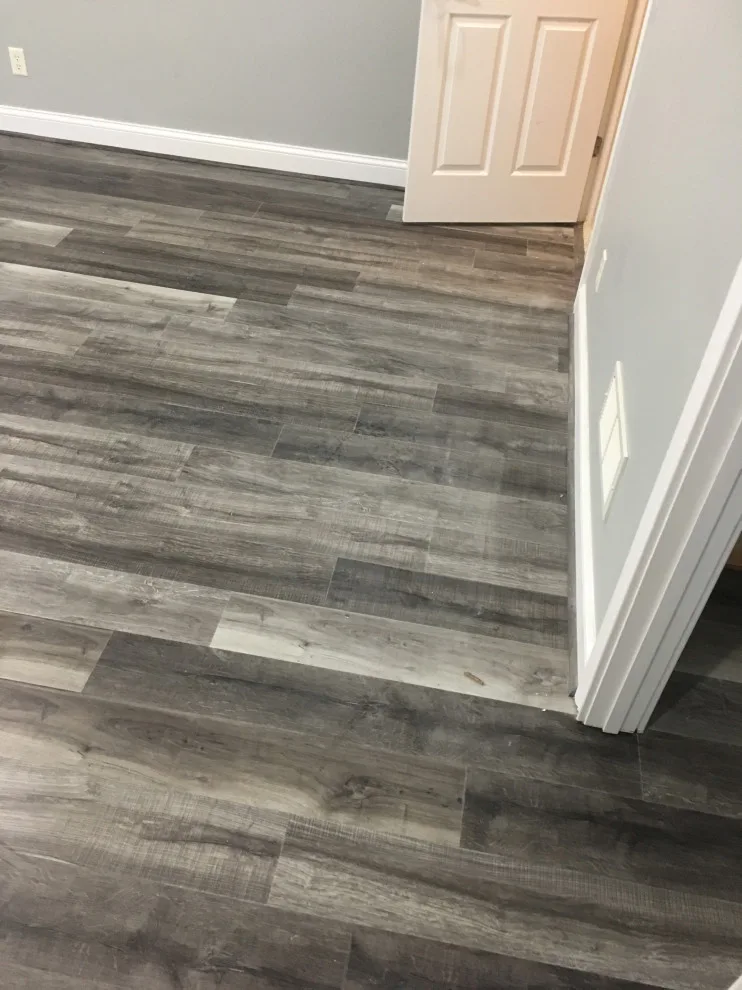 Basement apartment backsplash, updated master bathroom, bedroom flooring by Spencer Remodeling - Photo 2