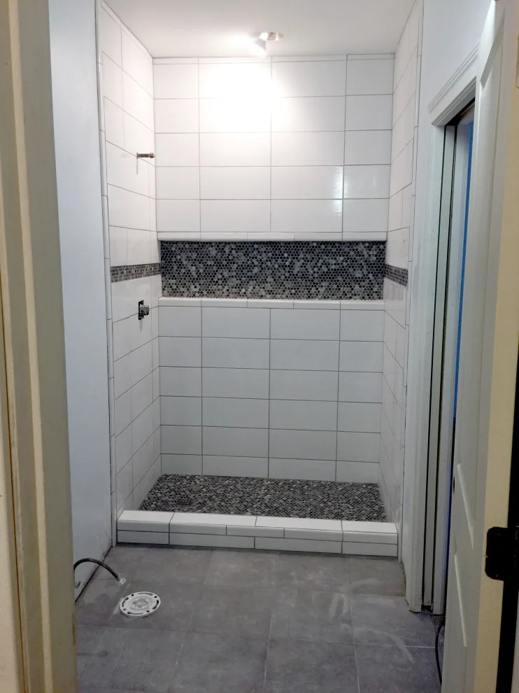 Lower-level restroom by Spencer Remodeling - Photo 6