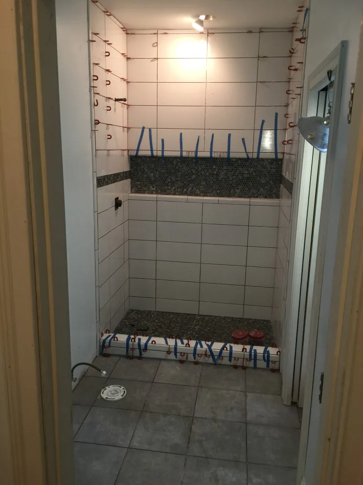 Lower-level restroom by Spencer Remodeling - Photo 3