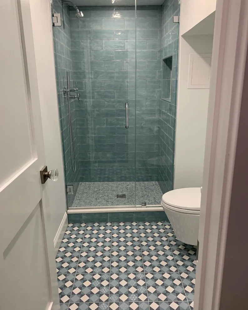 Basement Renovation: Newly Constructed Bathroom and Laundry Area by K & M Flooring-Renovations Inc. - Photo 7