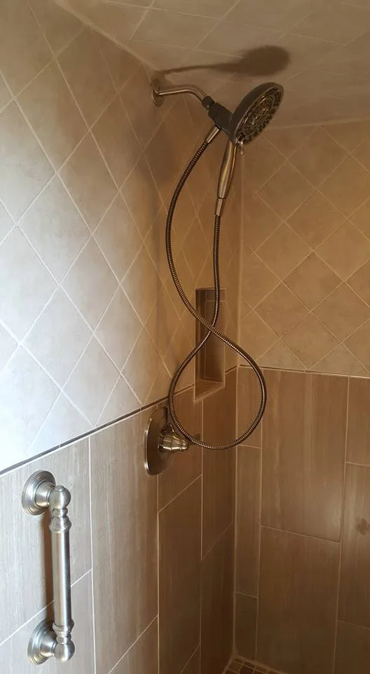 Restroom by Magnum Construction - Photo 9