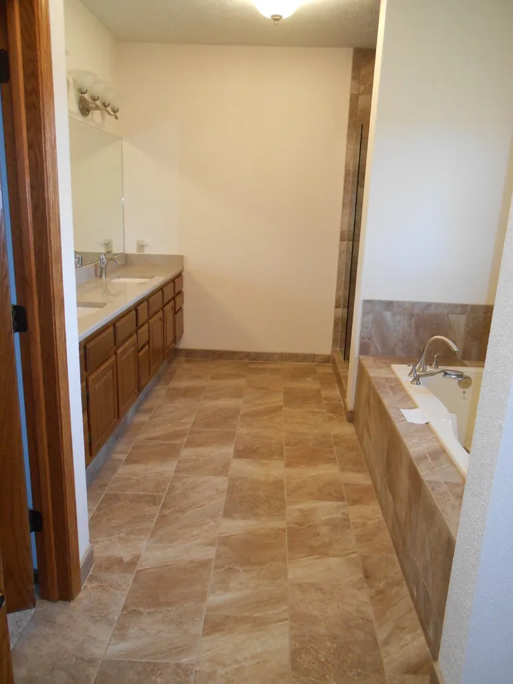 Calhoun Road Bathroom Renovation by McKean's Floor To Ceiling - Photo 7