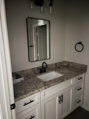 Restroom Renovation by J&M Construction Services - Photo 18