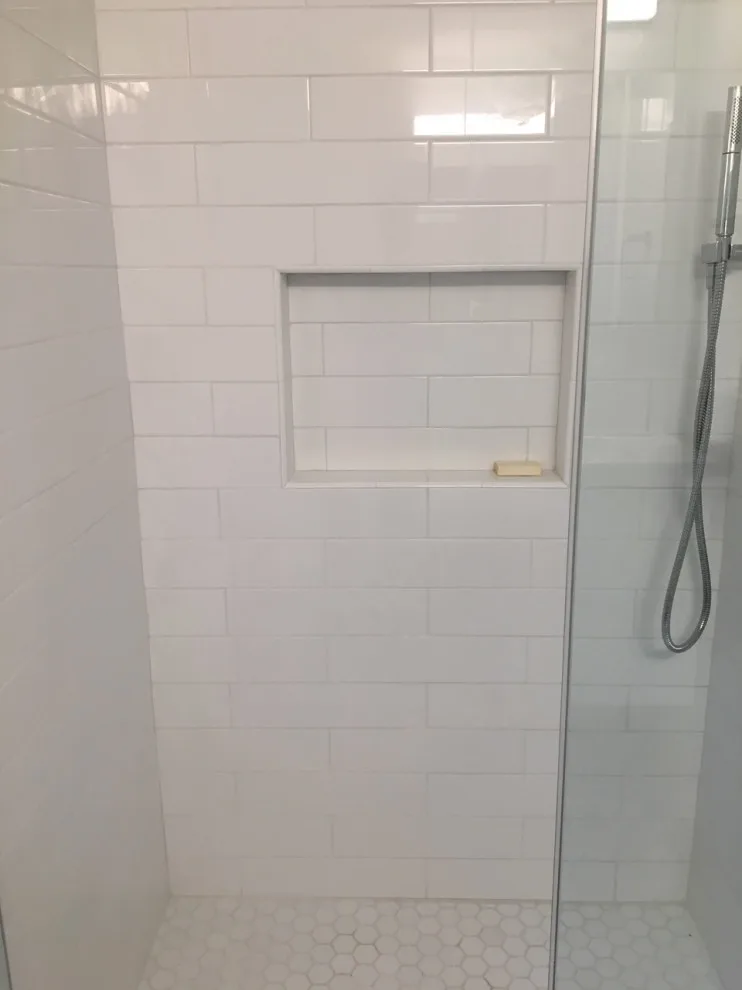 Radiant and Airy Bathroom Renovation by K & M Flooring-Renovations Inc. - Photo 3