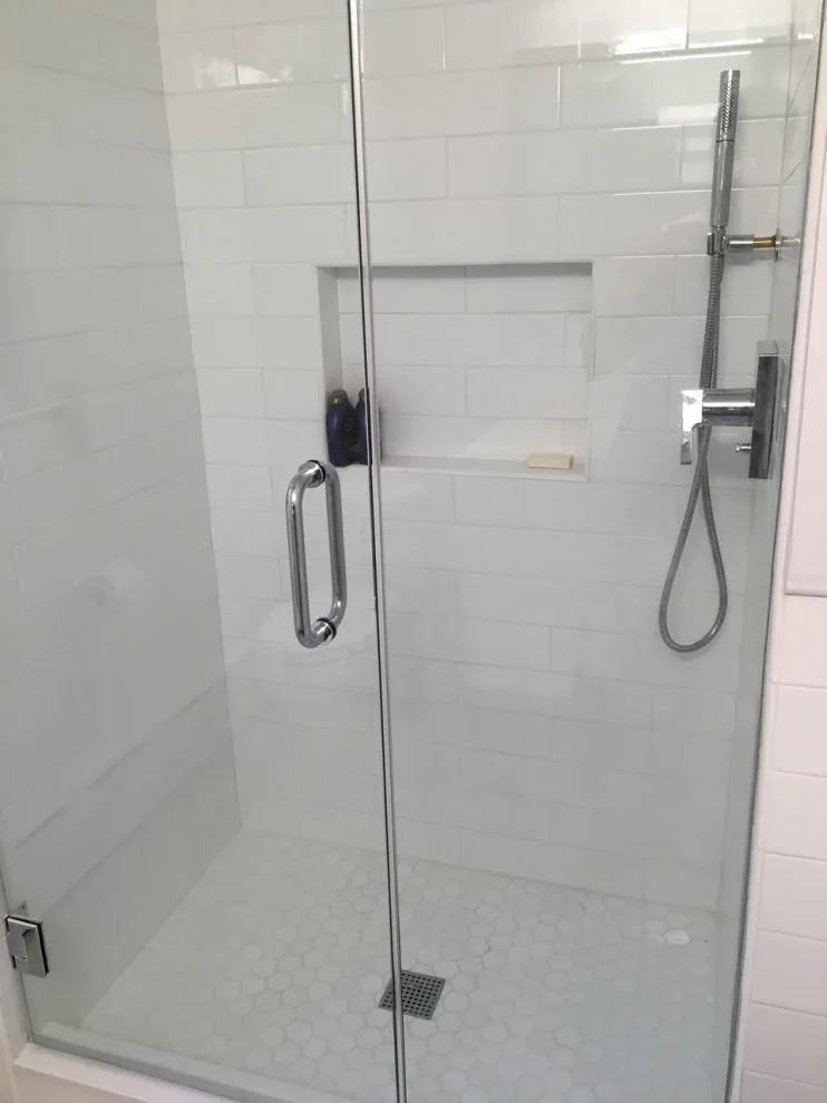 Radiant and Airy Bathroom Renovation by K & M Flooring-Renovations Inc. - Photo 6