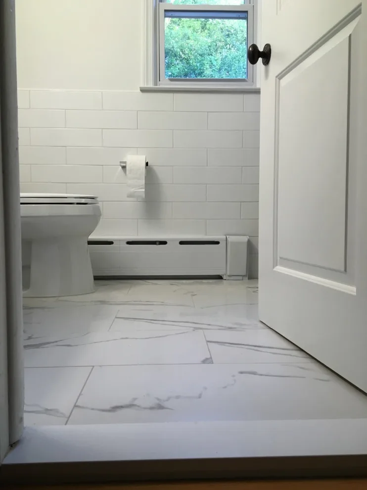 Radiant and Airy Bathroom Renovation by K & M Flooring-Renovations Inc. - Photo 7