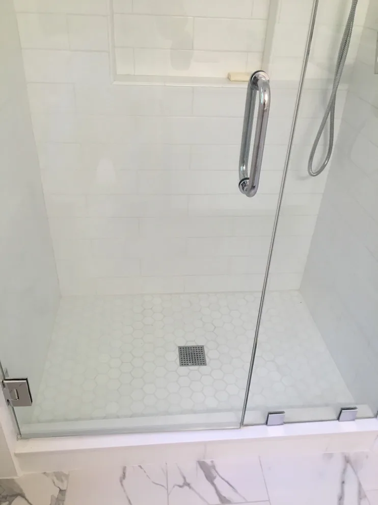 Radiant and Airy Bathroom Renovation by K & M Flooring-Renovations Inc. - Photo 4