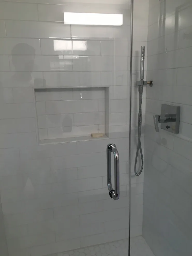 Radiant and Airy Bathroom Renovation by K & M Flooring-Renovations Inc. - Photo 5
