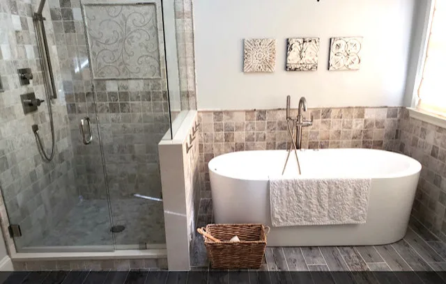 Restrooms by WHI Construction & Remodeling - Photo 9