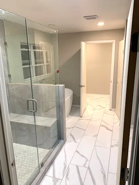 Restrooms by WHI Construction & Remodeling - Photo 3