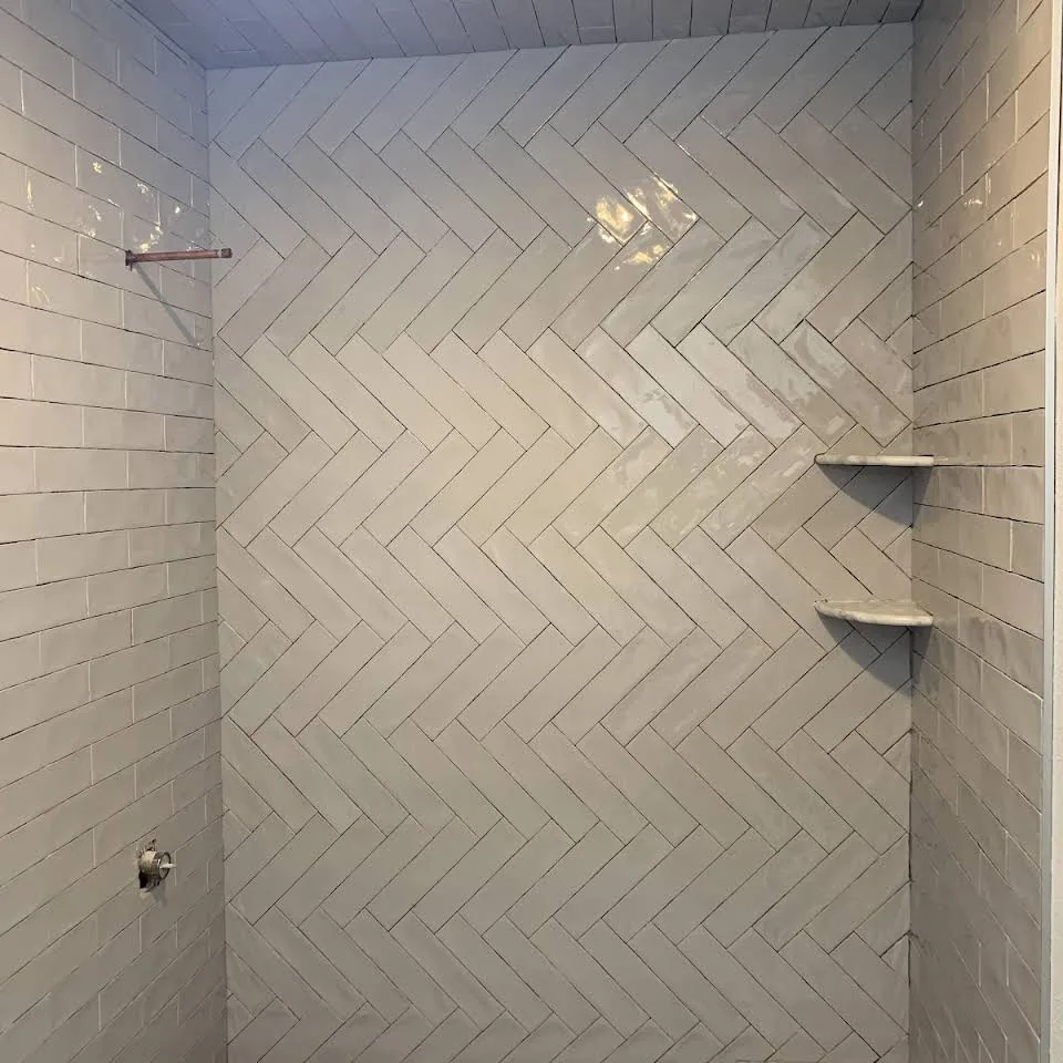 Restrooms by WHI Construction & Remodeling - Photo 5