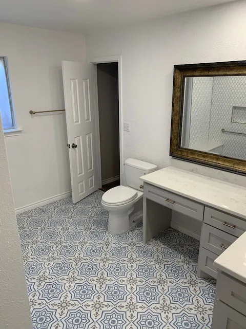 Restrooms by WHI Construction & Remodeling - Photo 6
