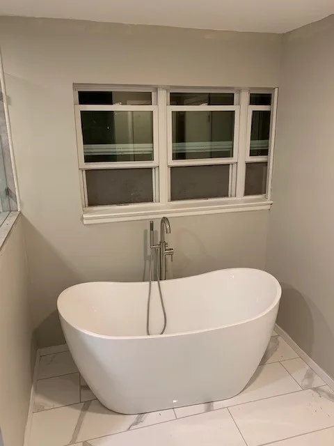 Restrooms by WHI Construction & Remodeling - Photo 7