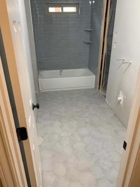 Restrooms by WHI Construction & Remodeling - Photo 4