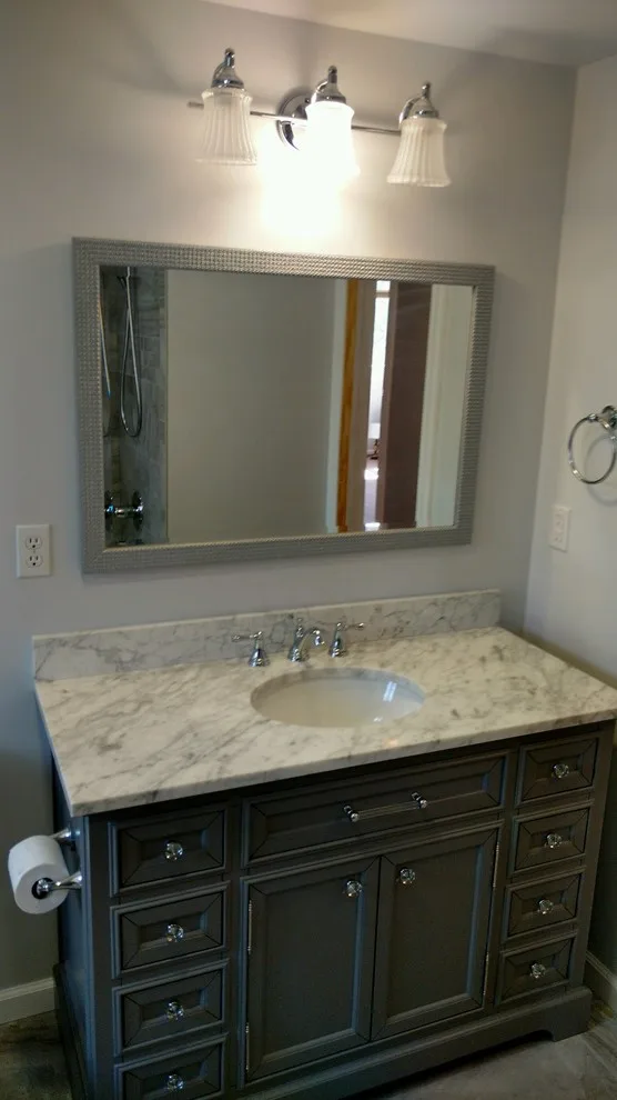 White Marble Vanity in the Bathroom by July's Quality Construction & Remodeling - Photo 2