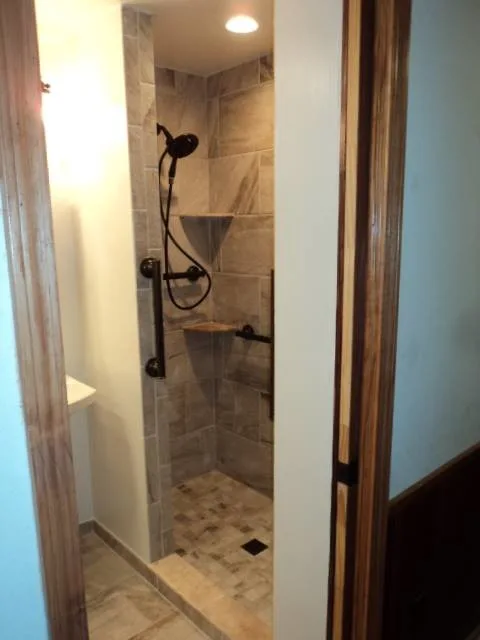 Restrooms by C.F. Master Craft Construction LLC - Photo 5