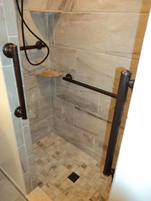 Restrooms by C.F. Master Craft Construction LLC - Photo 13