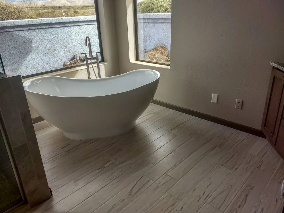Restrooms by Sierra Remodeling & Home Builders Inc. - Photo 6