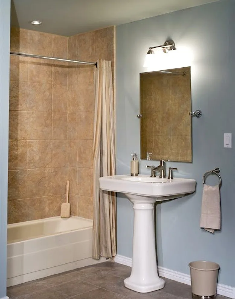 Restrooms by Sierra Remodeling & Home Builders Inc. - Photo 7