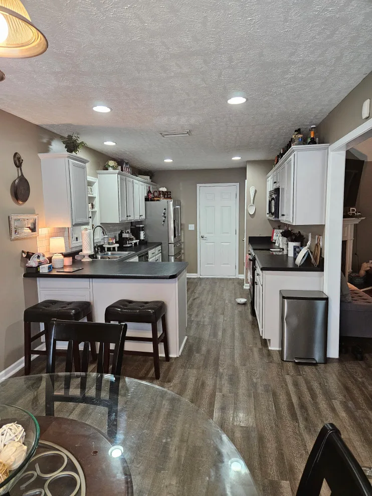 Stunning Kitchen Renovation Featuring New Two-Tone Cabinet Colors by Kitchen Solvers Of Spring Hill - Photo 8