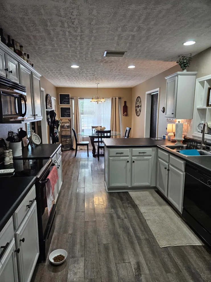 Stunning Kitchen Renovation Featuring New Two-Tone Cabinet Colors by Kitchen Solvers Of Spring Hill - Photo 2