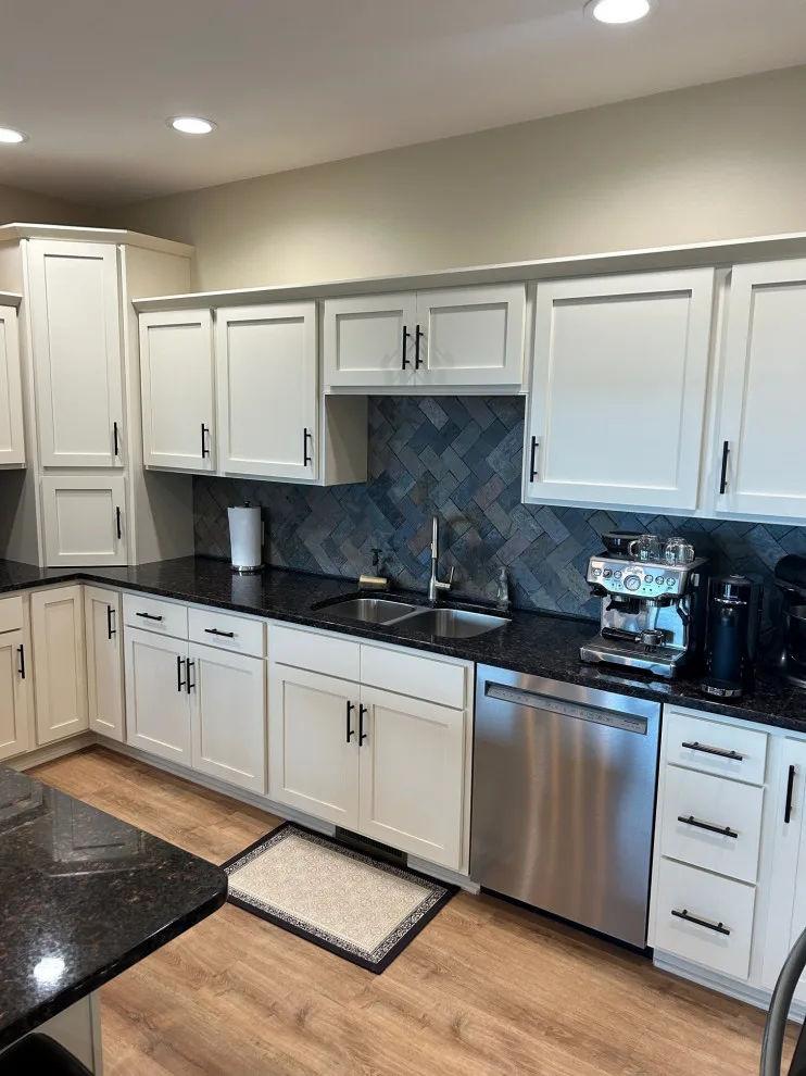 Elegant Kitchen Renovation Featuring Ivory Cabinets by Kitchen Solvers Of Eau Claire - Photo 4