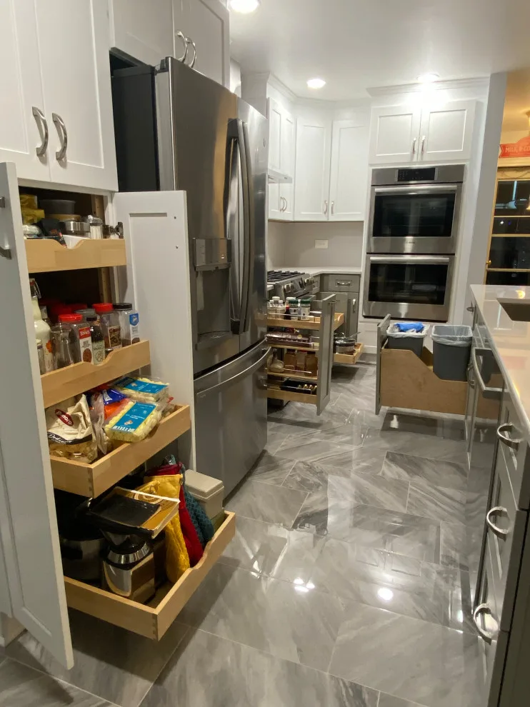 Stunning Kitchen Makeover Featuring Dual-Colored Cabinets by Kitchen Solvers Of Grayslake - Photo 15
