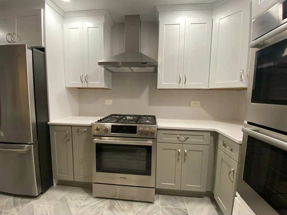 Stunning Kitchen Makeover Featuring Dual-Colored Cabinets by Kitchen Solvers Of Grayslake - Photo 20