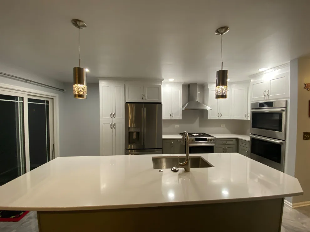 Stunning Kitchen Makeover Featuring Dual-Colored Cabinets by Kitchen Solvers Of Grayslake - Photo 7