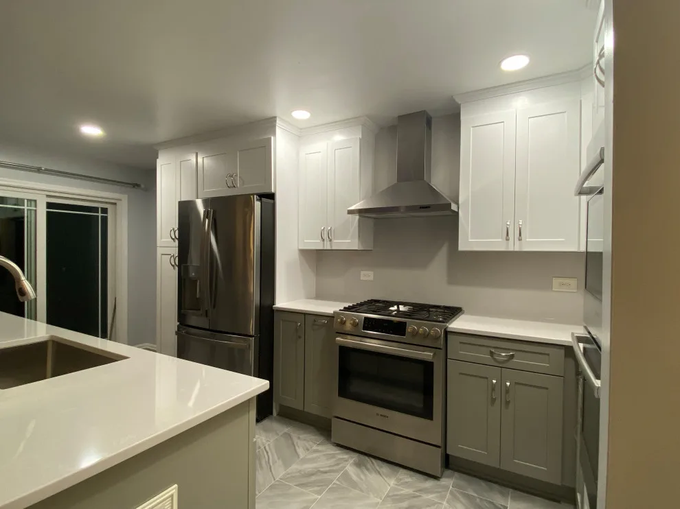 Stunning Kitchen Makeover Featuring Dual-Colored Cabinets by Kitchen Solvers Of Grayslake - Photo 17