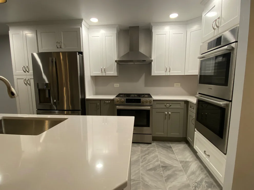 Stunning Kitchen Makeover Featuring Dual-Colored Cabinets by Kitchen Solvers Of Grayslake - Photo 3