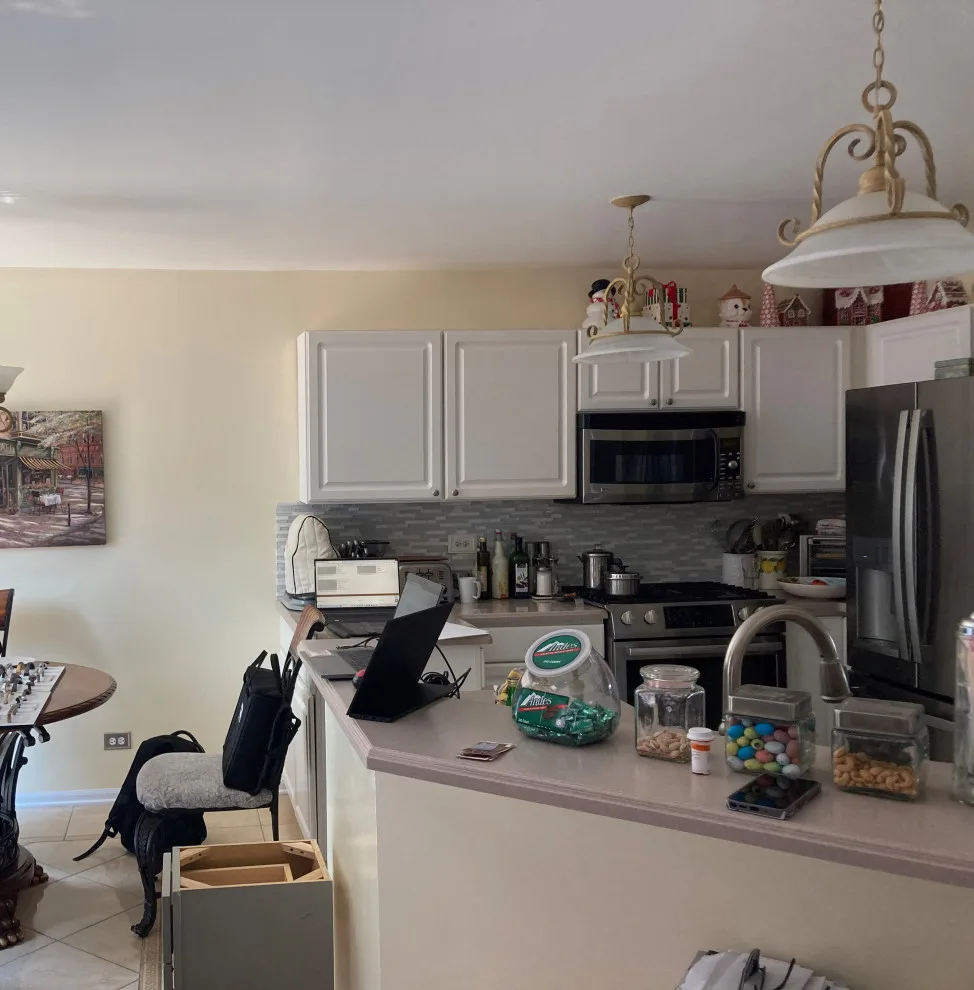 Stunning Kitchen Makeover Featuring Dual-Colored Cabinets by Kitchen Solvers Of Grayslake - Photo 11
