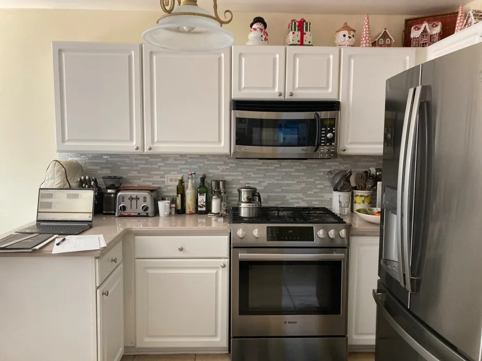 Stunning Kitchen Makeover Featuring Dual-Colored Cabinets by Kitchen Solvers Of Grayslake - Photo 16
