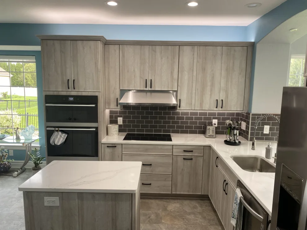 Stunning Contemporary Kitchen Renovation Through Cabinet Refacing by Kitchen Solvers Of Fort Wayne & Toledo - Photo 3