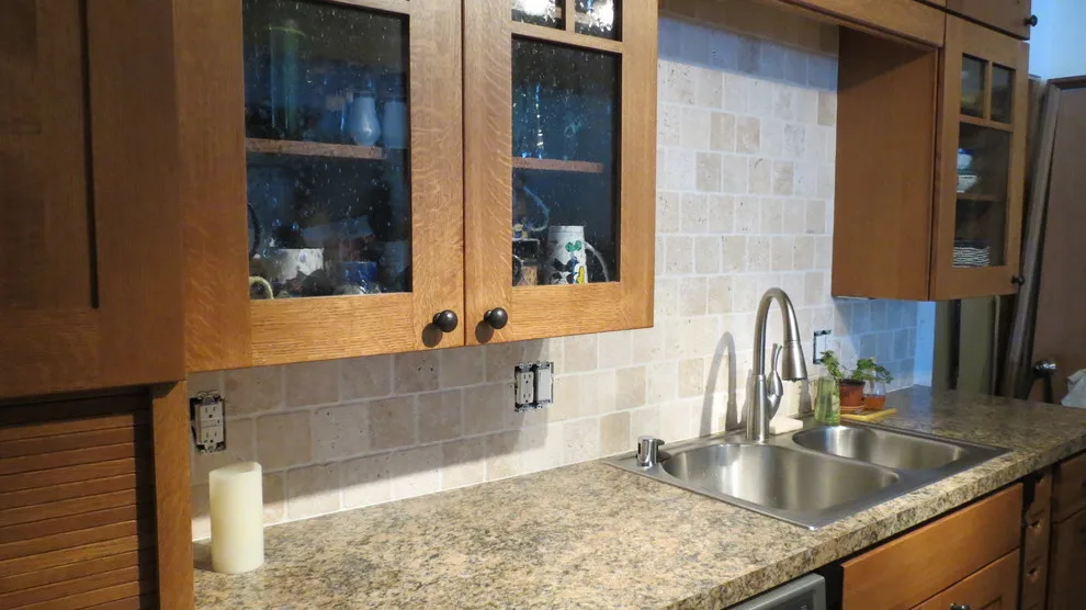 Kitchen renovation for a galley layout by Skyline Remodeling - Photo 15