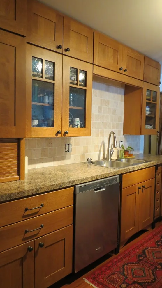 Kitchen renovation for a galley layout by Skyline Remodeling - Photo 8