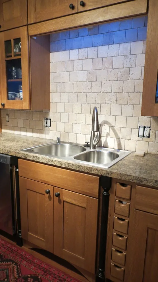 Kitchen renovation for a galley layout by Skyline Remodeling - Photo 13