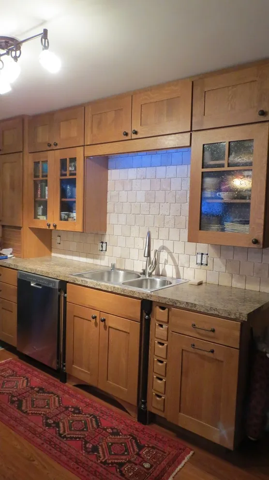 Kitchen renovation for a galley layout by Skyline Remodeling - Photo 6