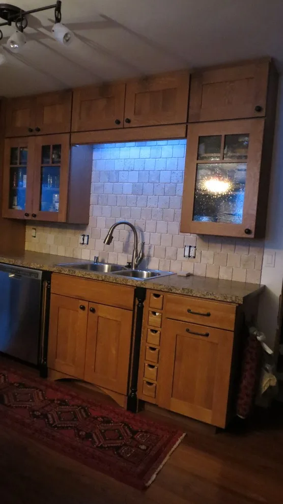 Kitchen renovation for a galley layout by Skyline Remodeling - Photo 14