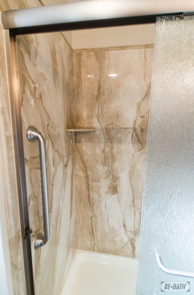 Bathroom Renovation with Natural Stone by Re-Bath Omaha - Photo 5