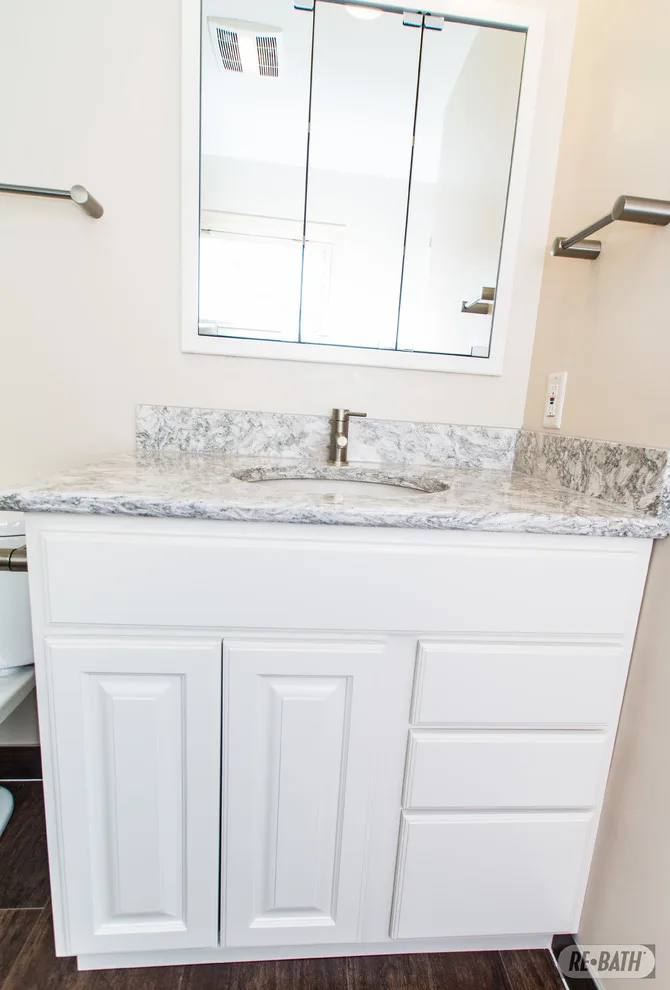 Bathroom Renovation with Natural Stone by Re-Bath Omaha - Photo 6