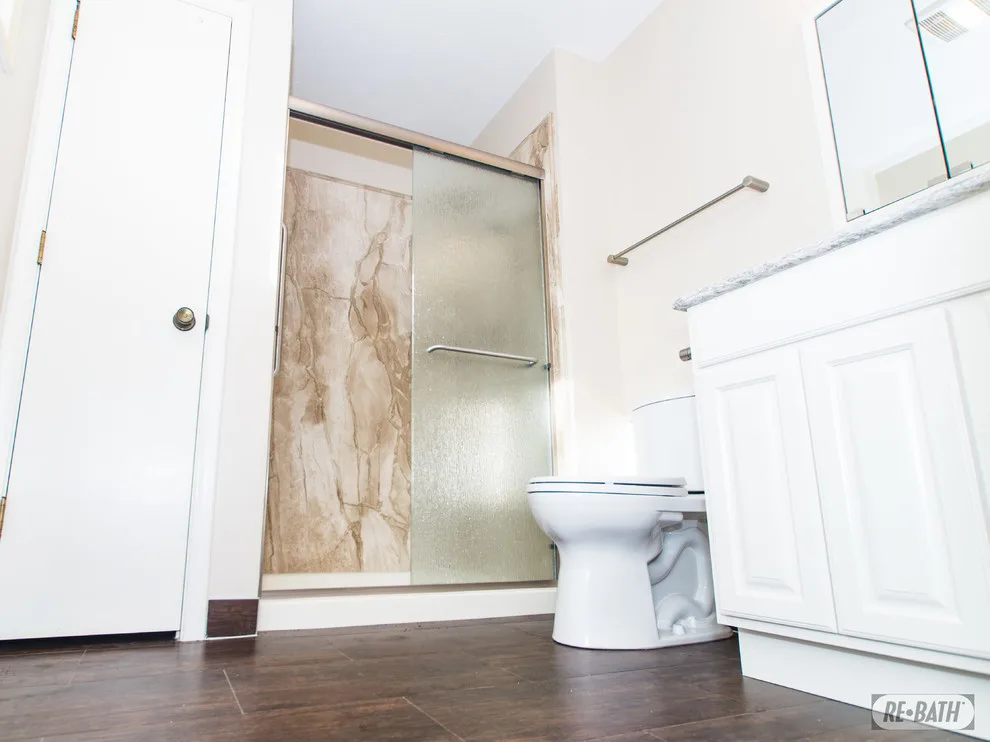 Bathroom Renovation with Natural Stone by Re-Bath Omaha - Photo 2